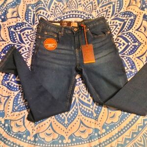 Weatherproof low rise skinny jeans